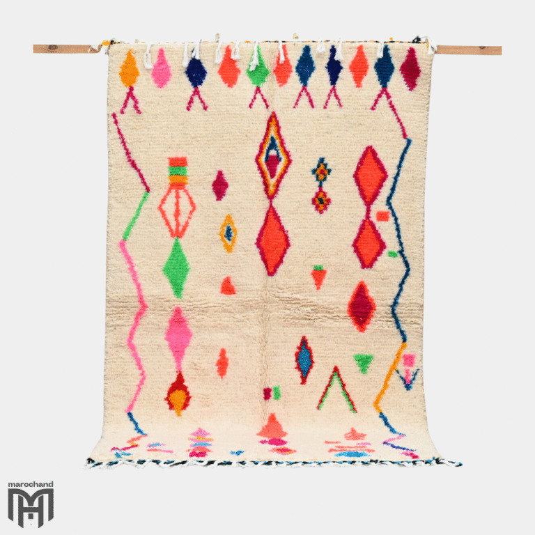 Azilal rug folded edge showing colorful selvedge and tassels